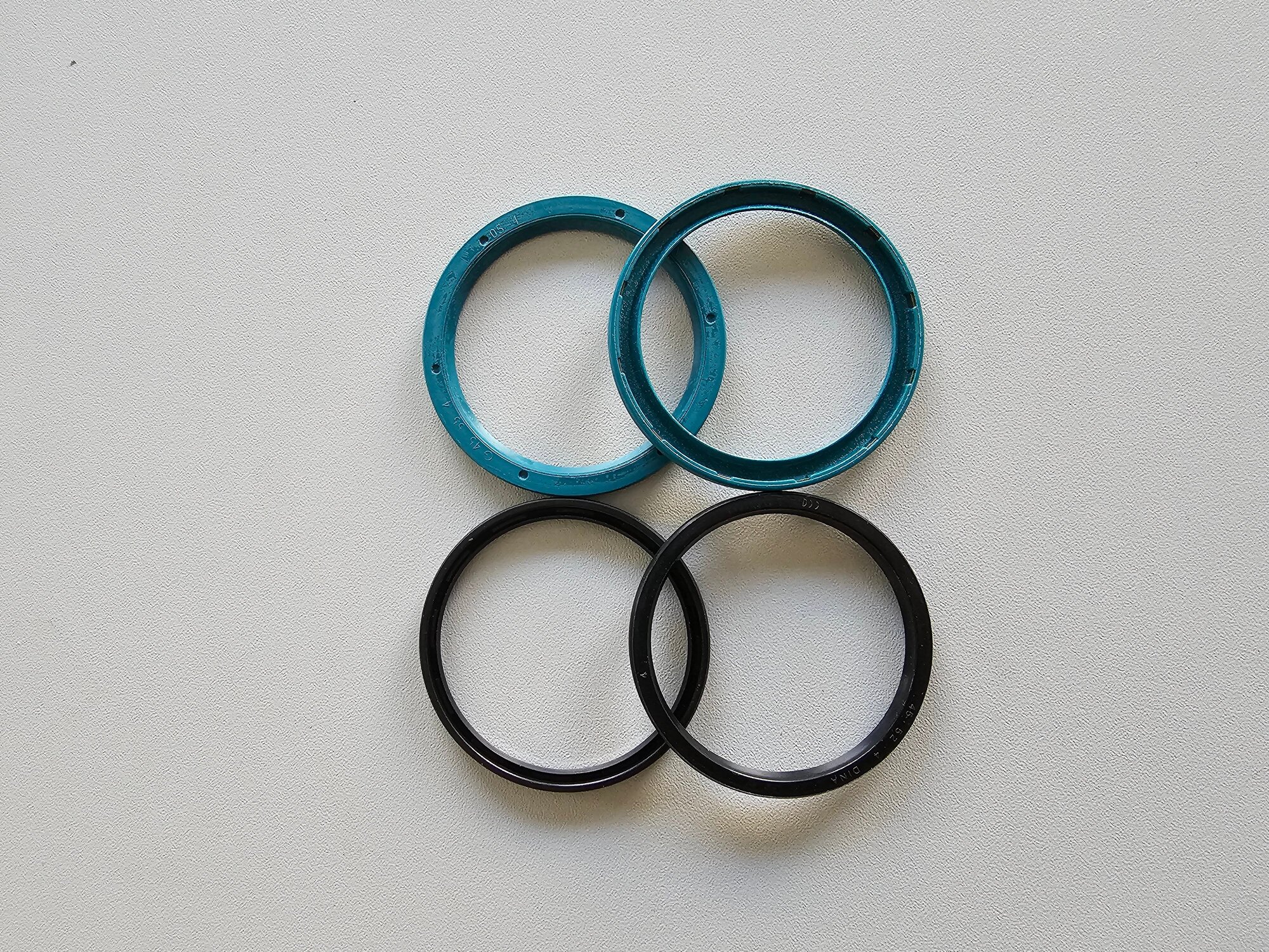 Radial shaft seal with elastomer outer jacket